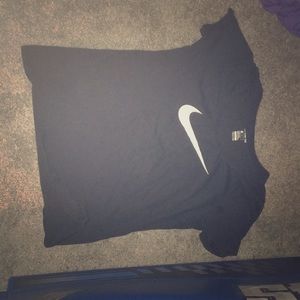 Two Nike short sleeved shirts black, purple, white